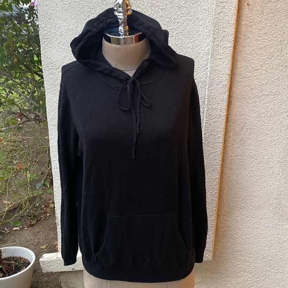 Brandy Melville Tops - Brandy Melville hoodie black stretchy  sweatshirt with pockets. Adorable!